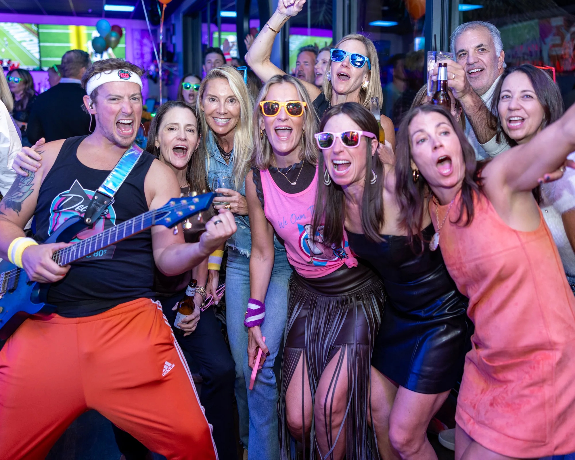 Fans celebrating with the Decade80 guitarist